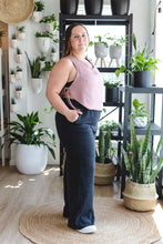 Charger l'image dans la galerie, Wide black pants with elastic waistband for women. DV