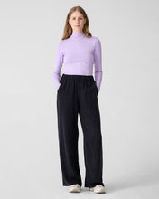 Charger l'image dans la galerie, Wide black pants for women with elastic waist. DV. Lilac longsleeve turtleneck for women.