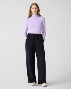 Wide black pants for women with elastic waist. DV. Lilac longsleeve turtleneck for women. 